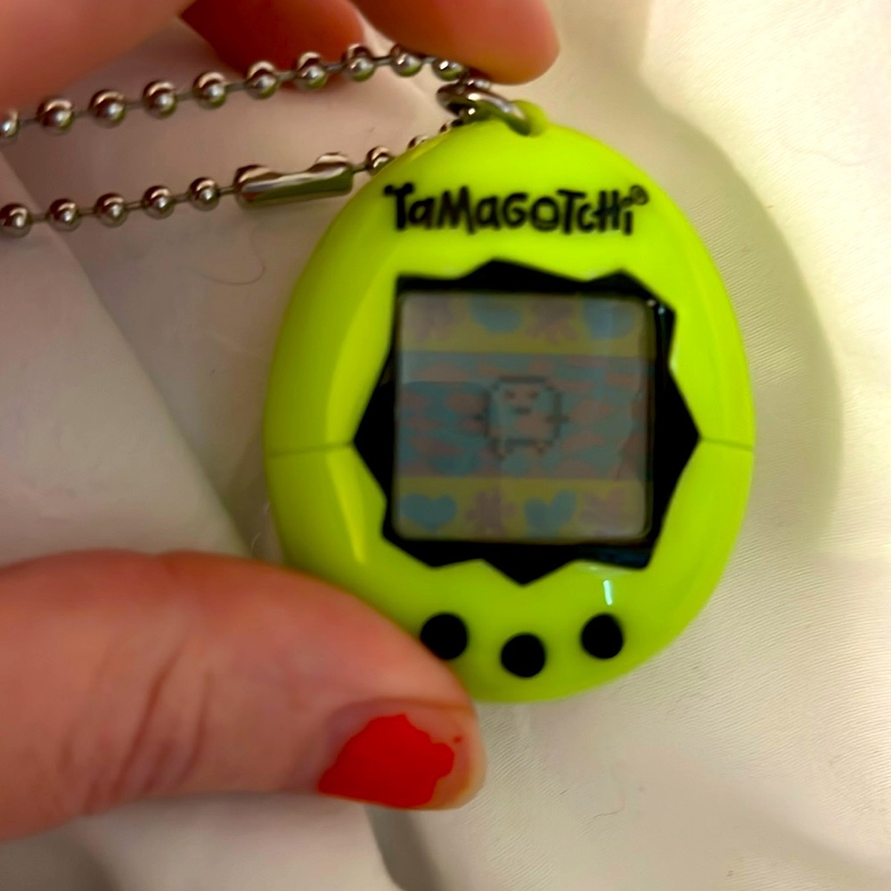 Green tamagotchi generation 1 mint condition only used for a week